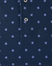 Detail view of the Al Fresco Polo in New Indigo showing the small blue floral motif with pink centers and branded buttons.