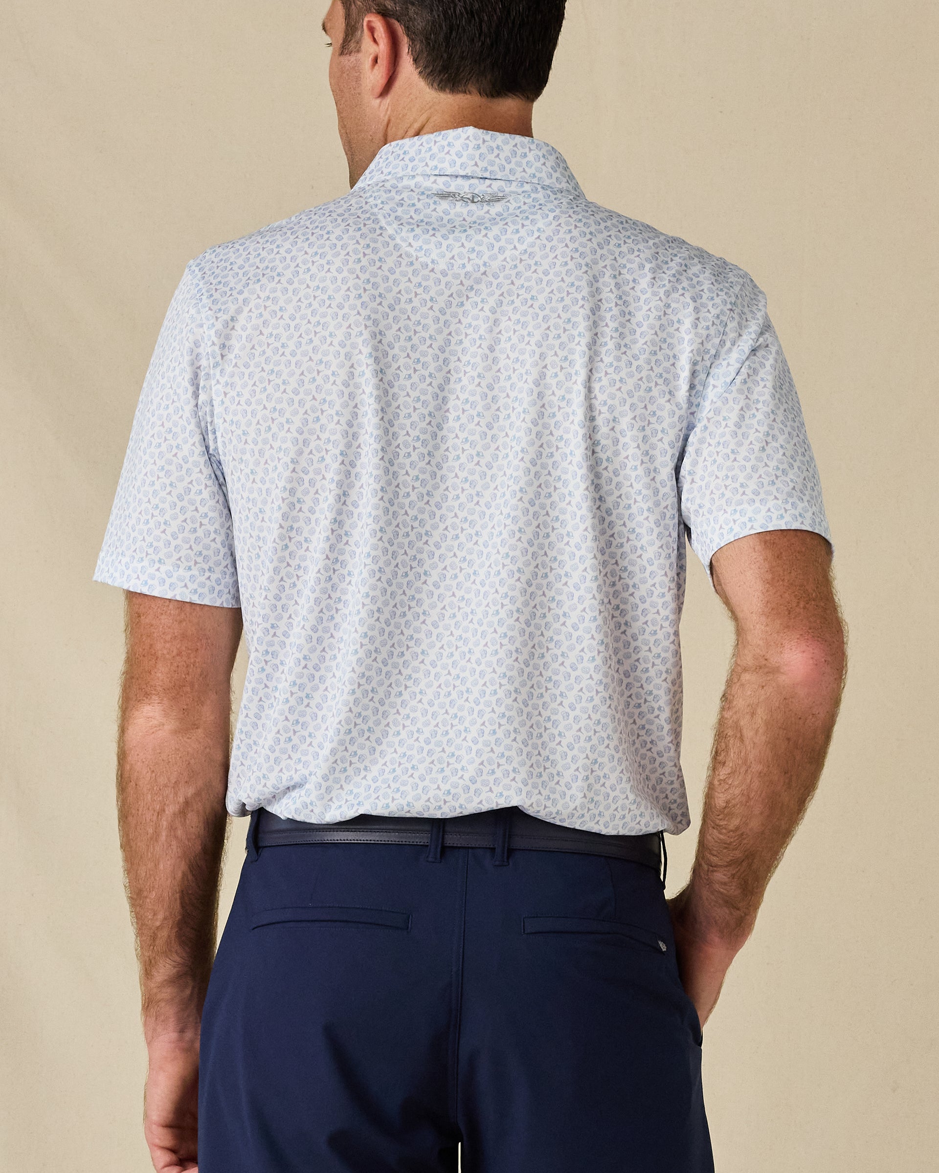 Back view of the Hofbrau Polo in Blue Shade, highlighting the all-over print and embroidered logo below the collar.