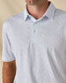 Close-up of the Hofbrau Polo in Blue Shade, highlighting the small-scale novelty print, collar, and button placket.