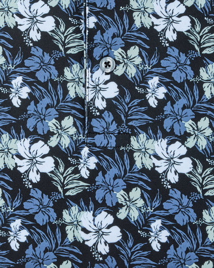 Close-up of the Hawaii 5.0 Polo showing the black fabric, blue and light green hibiscus print, button, and placket stitching.