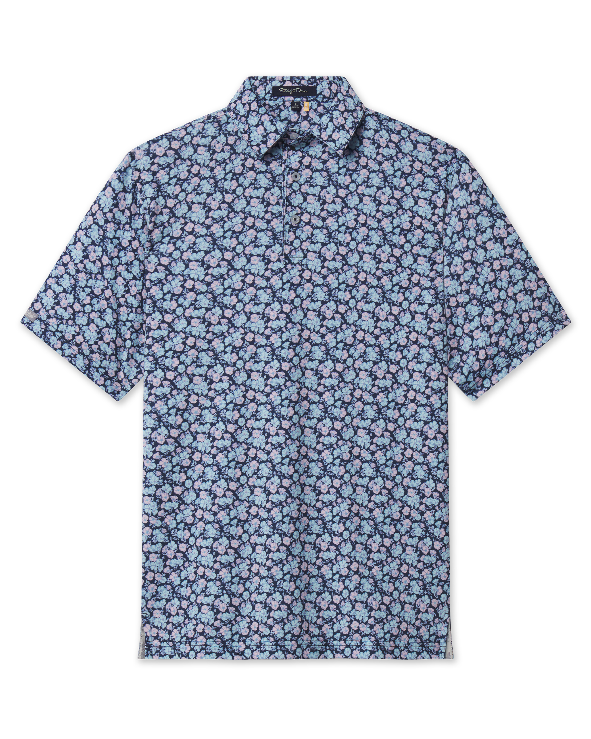 A short-sleeve polo with a dense floral print in light blue, pink, and white over a dark navy background. The brand label 'Straight Down' is visible inside the collar.