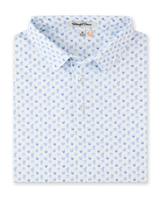 Folded Trader Vics Polo in Blue Shade featuring an all-over cocktail drink print in soft blue and aqua tones.