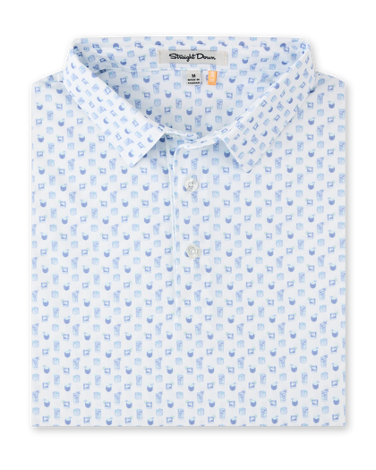 Folded Trader Vics Polo in Blue Shade featuring an all-over cocktail drink print in soft blue and aqua tones.