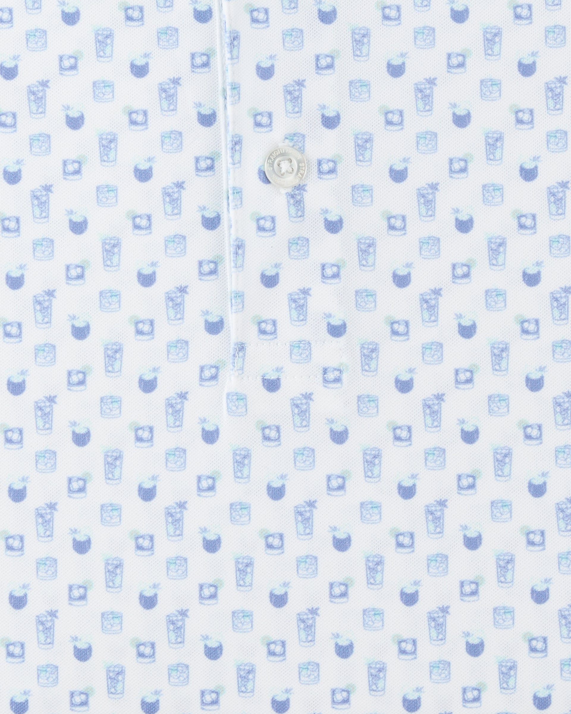 Close-up of the Trader Vics Polo in Blue Shade highlighting the cocktail-inspired print, button placket, and fabric texture.
