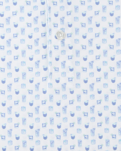Close-up of the Trader Vics Polo in Blue Shade highlighting the cocktail-inspired print, button placket, and fabric texture.