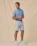 Men’s Aloha 250 Polo in Cobalt Blue, styled full outfit view with light shorts