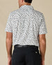 Rear view of the Siesta Polo in Herb, showing the all-over Western print and subtle embroidered logo below the collar.