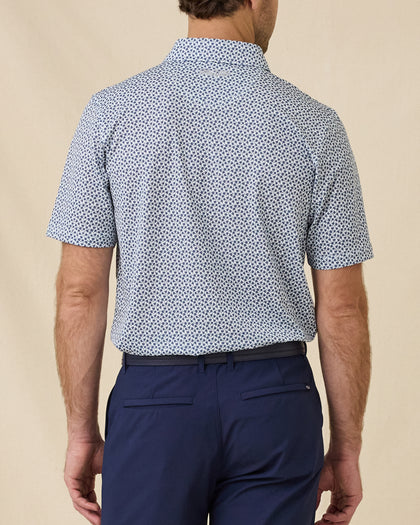 Back view of the Date Palm Polo in New Indigo featuring an allover navy palm tree print