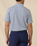 Back view of the Date Palm Polo in New Indigo featuring an allover navy palm tree print
