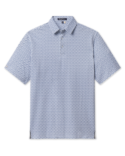 Front view of the Date Palm Polo in New Indigo featuring an allover navy palm tree print