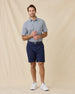 Model wearing the Date Palm Polo in New Indigo styled with navy shorts