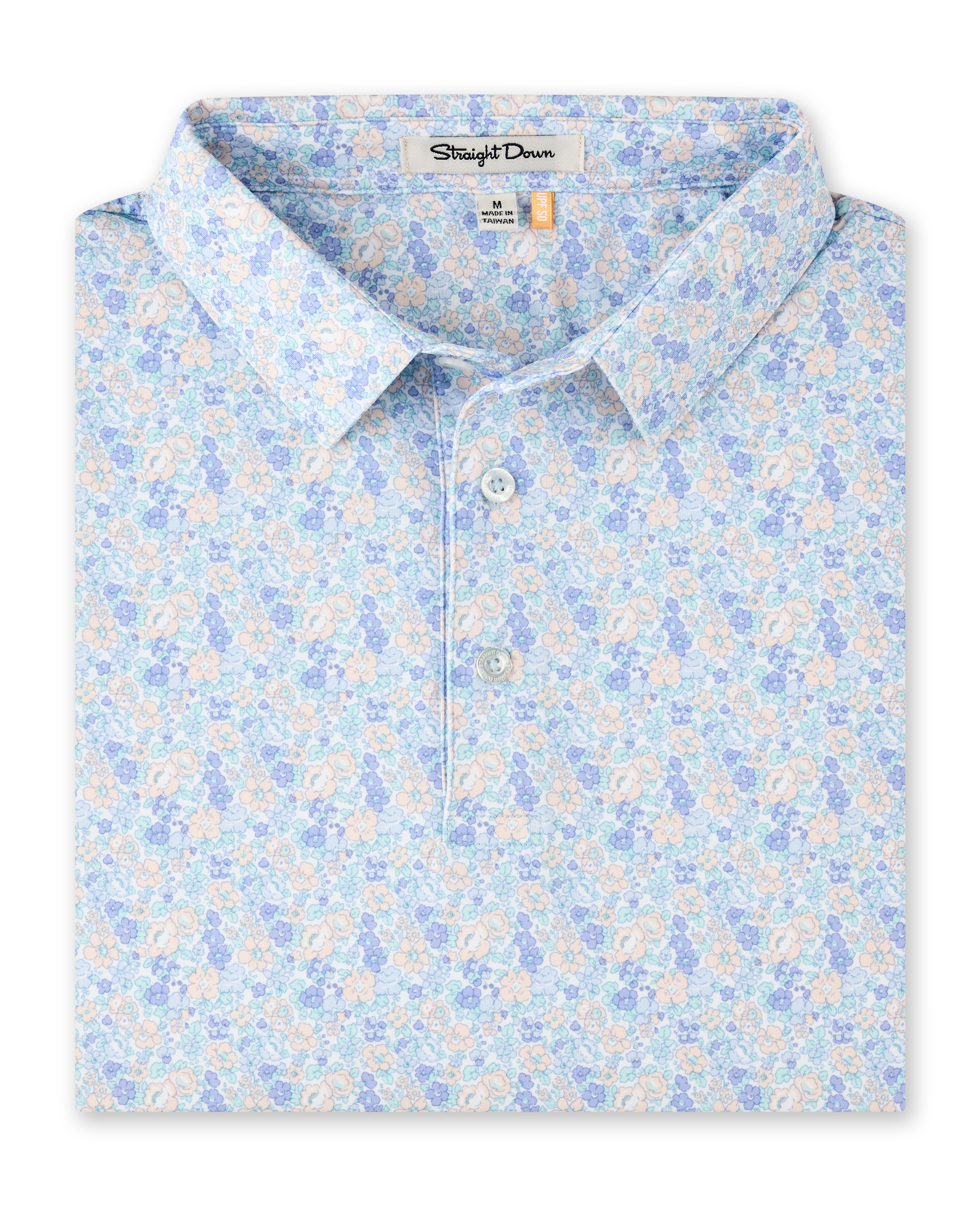 Folded Pasadena Polo in Lake featuring an all-over floral print in soft blue, lavender, aqua, and peach tones.