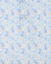 Close-up of the Pasadena Polo in Lake highlighting the floral print, button placket, and fabric detail.