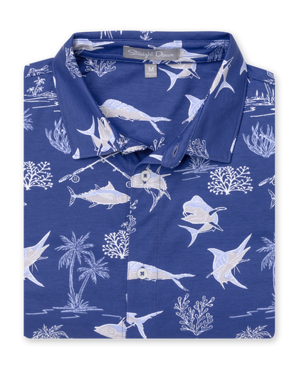 Islamorada Full Button Polo in Skipper, folded flat lay front view featuring a blue base with an all-over white nautical print of marlin, sailfish, coral, palm trees, and fishing rods