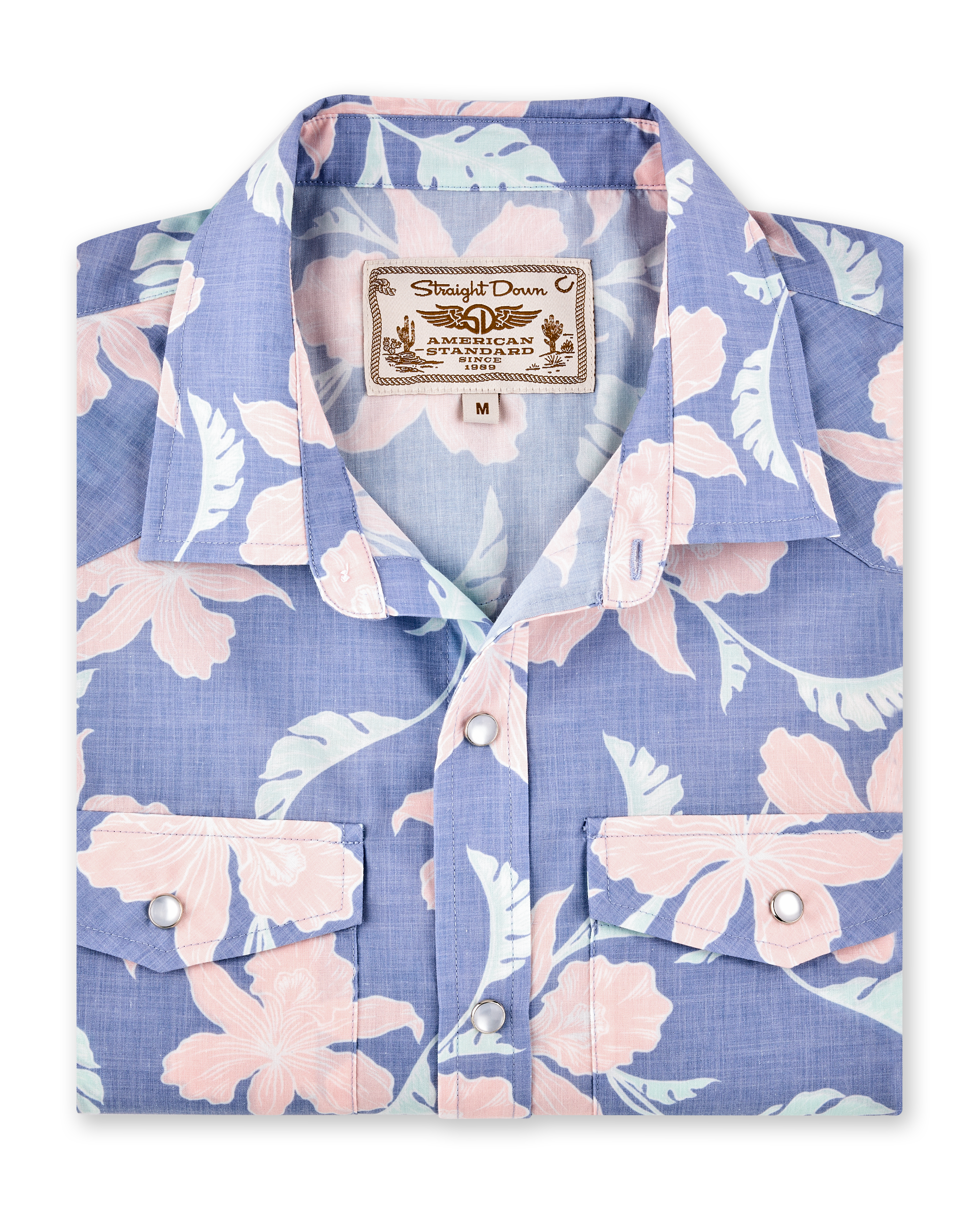 Folded blue short-sleeve shirt with a pink floral print, pearl snap buttons and dual chest pockets.