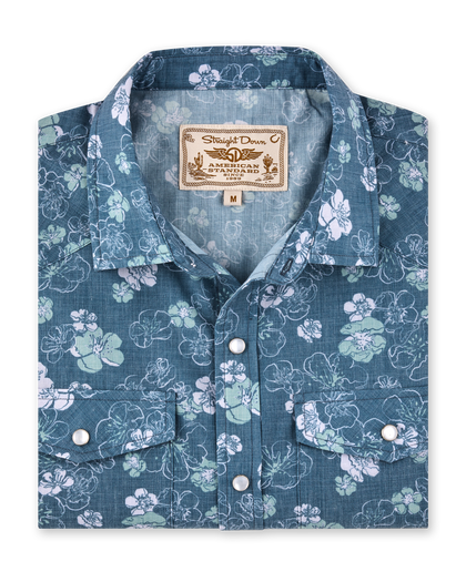 Celadine Woven Shirt in Moonlight featuring a blue floral print, pearl snap buttons, and western-style chest pockets.