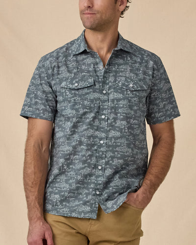 Model wearing the Out West Woven Shirt in Walrus with tan pants.