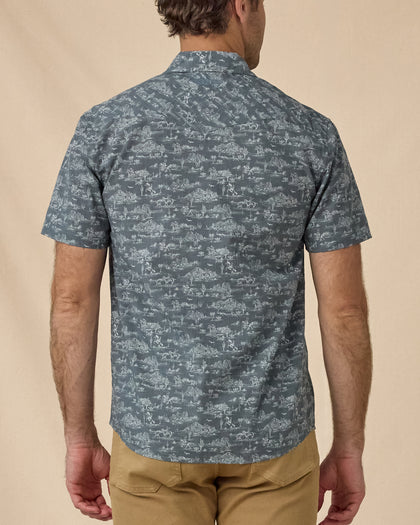 Rear view of the Out West Woven Shirt showing the western desert print and short-sleeve fit.