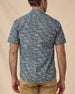 Rear view of the Out West Woven Shirt showing the western desert print and short-sleeve fit.