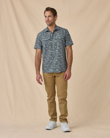 Model wearing the Out West Woven Shirt in Walrus with tan pants and white sneakers.