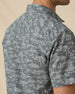 Close-up of the back of the Out West Woven Shirt showing the western desert print and yoke detailing.