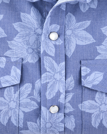 Fabric detail of the Treviso Bay Woven Shirt in Tidal Blue showing the textured broad cloth construction and tonal floral print