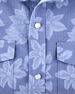 Fabric detail of the Treviso Bay Woven Shirt in Tidal Blue showing the textured broad cloth construction and tonal floral print