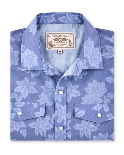 Treviso Bay Woven Shirt in Tidal Blue folded view featuring a tonal floral print, western yoke detailing, and pearl snap buttons