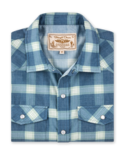 Folded Jasper Woven Shirt in Moonlight featuring a blue and light green plaid pattern, pearl snap buttons, and western-inspired detailing.