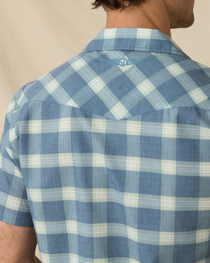 Close-up of the Jasper Woven Shirt in Moonlight showing the western back yoke and embroidered logo below the collar.
