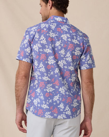 Back view of the Paniolo Woven Shirt in Tidal Blue featuring an allover hibiscus floral print and western-inspired yoke