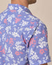 Back shoulder detail of the Paniolo Woven Shirt in Tidal Blue highlighting the hibiscus floral print and western-style yoke construction