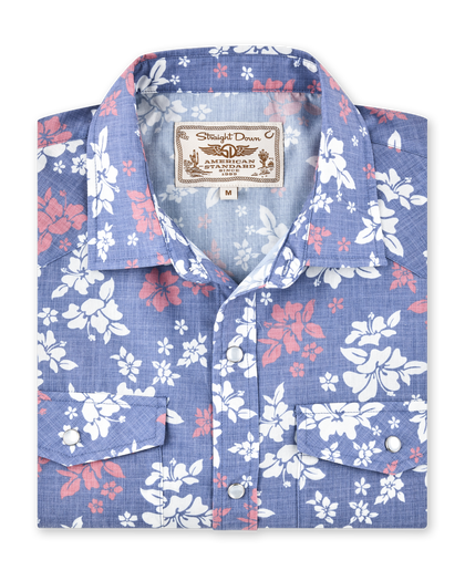 Folded Paniolo Woven Shirt in Tidal Blue with allover hibiscus floral print and western-inspired pearl snap details