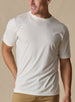 Men's Luxe Tee in Cream, on model front view featuring a cream short sleeve crew neck tee with a  Straight Down woven label at the left sleeve