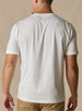 Men's Luxe Tee in Cream, on model back view featuring a cream short sleeve crew neck tee with a  Straight Down woven label at the left sleeve