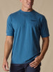 Vegas Vacation Graphic Tee in Petrol, front model view featuring a heathered blue short-sleeve crewneck tee with a Straight Down logo at the left chest, paired with navy pants