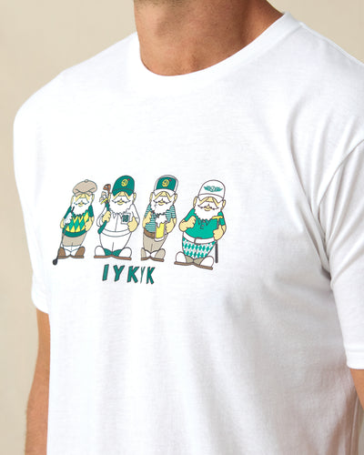 Men's IYKYK Tee in White, close-up front view on model highlighting the four golf gnome characters in green and gold with IYKYK text below