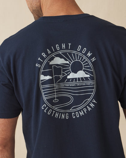 Back graphic of navy t-shirt with large golf course and sun logo design