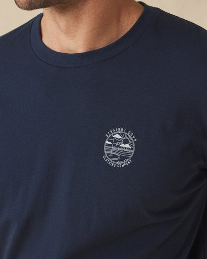 Close-up of navy t-shirt with Straight Down golf logo graphic on chest