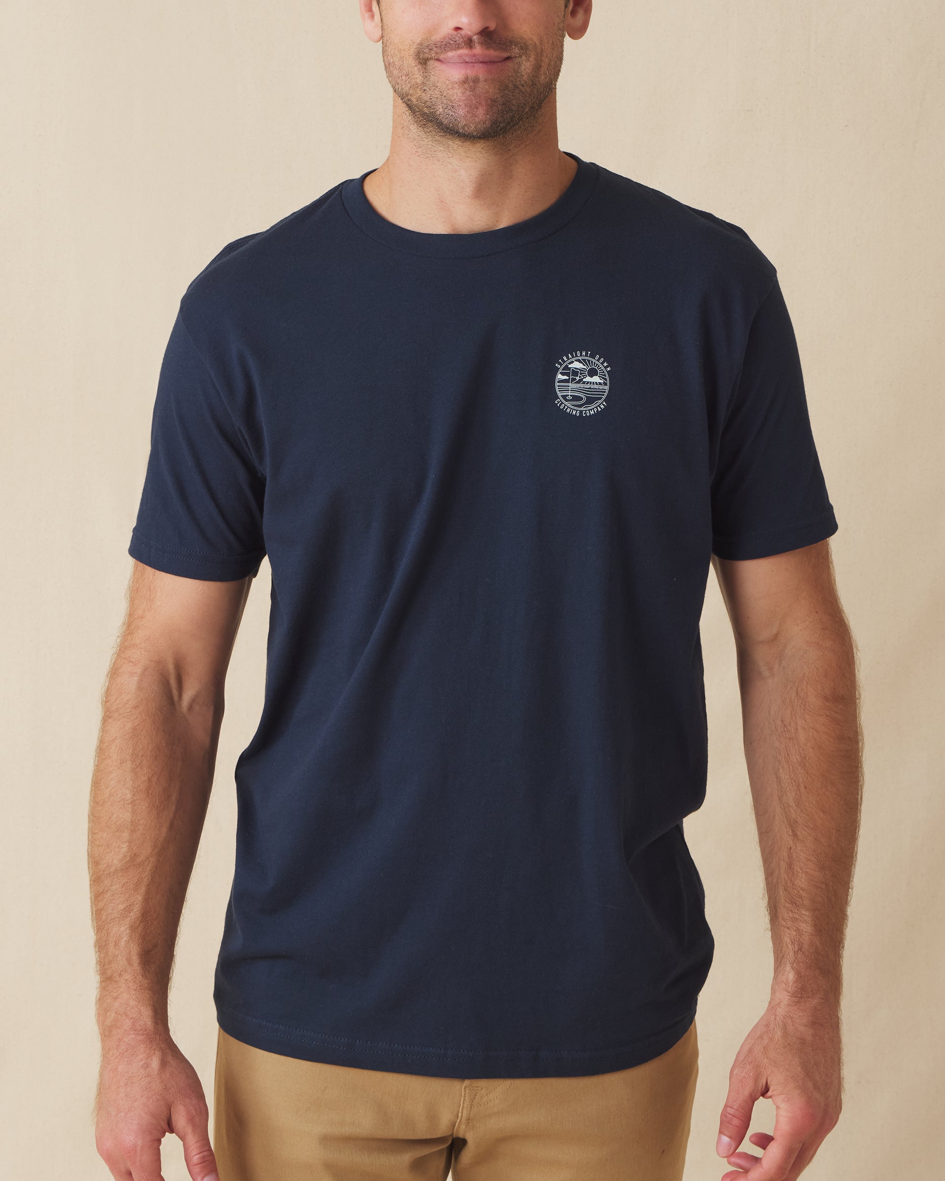 Men’s navy graphic t-shirt with small golf-inspired logo on chest