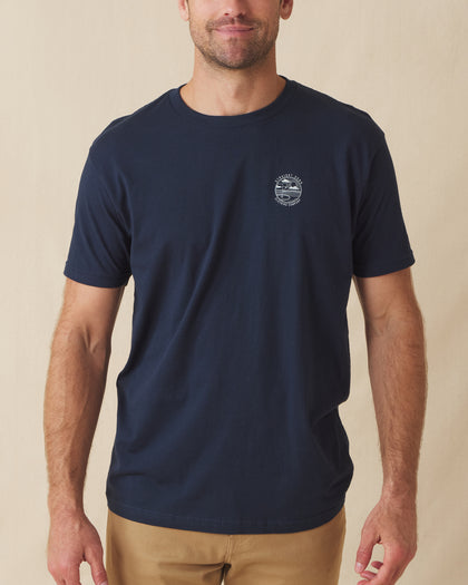 Men’s navy graphic t-shirt with small golf-inspired logo on chest