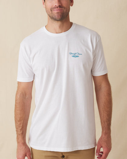 Men's Island Time Tee in White, front view on model featuring a white crew neck tee with a small blue Straight Down logo graphic on the left chest, styled with khaki pants