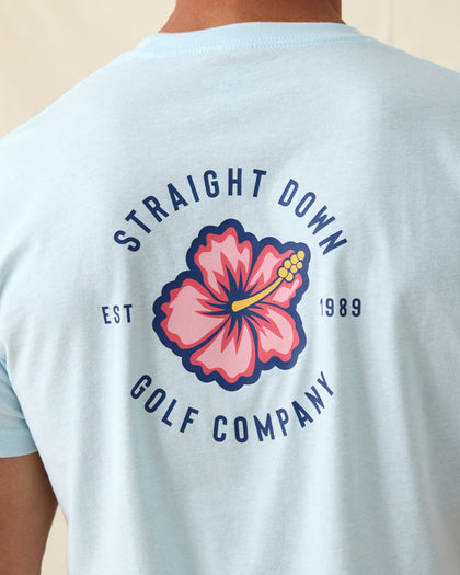 Men's Hibiscus 89 Tee in Light Blue, close-up back view on model featuring a large Straight Down Golf Company hibiscus graphic with "EST 1989" detail centered on the back