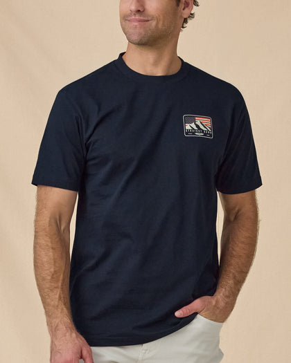 Sierra Tee in Navy, front model view with chest graphic