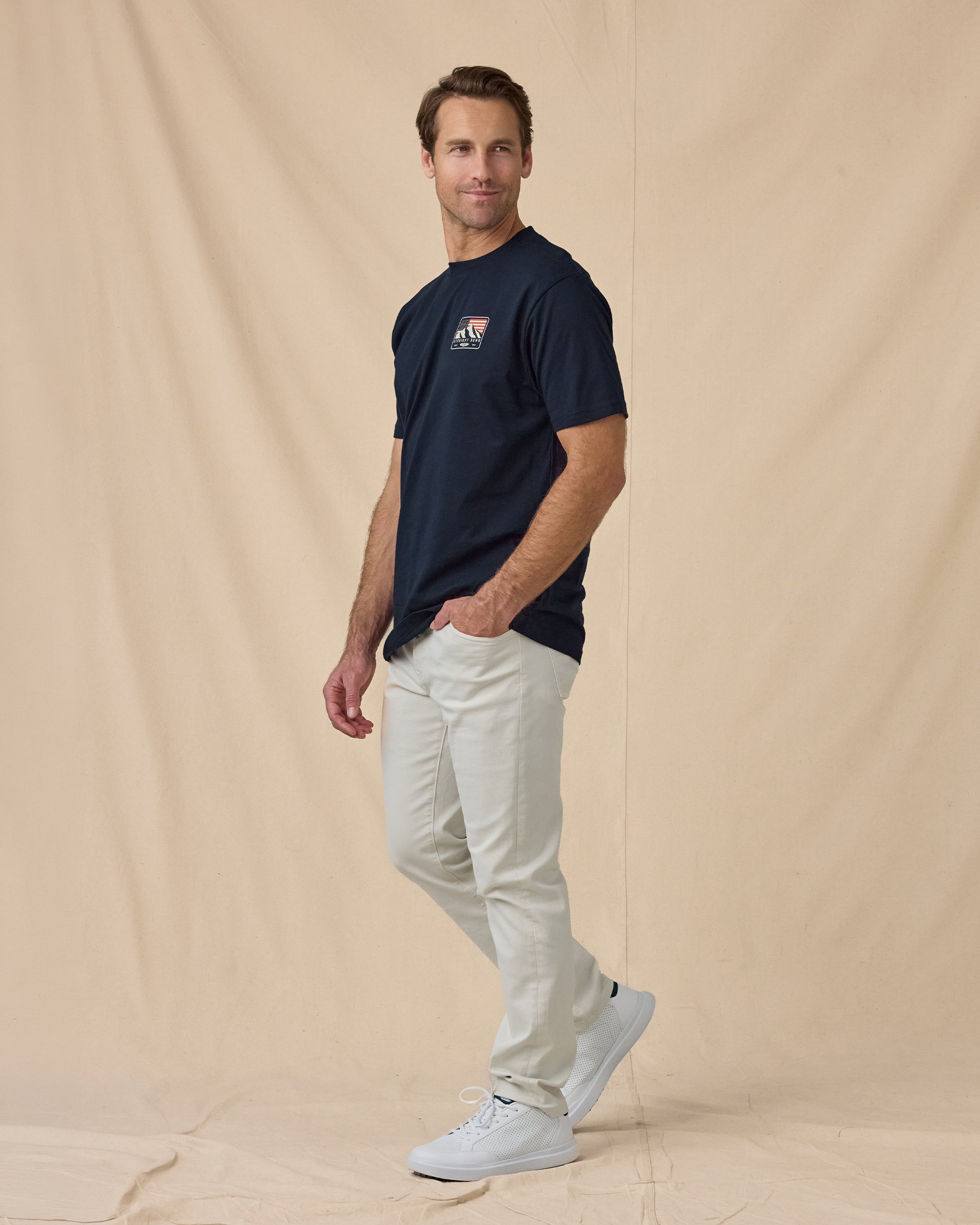 Sierra Tee in Navy, styled full outfit view with light pants