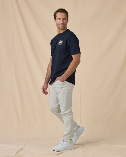 Sierra Tee in Navy, styled full outfit view with light pants