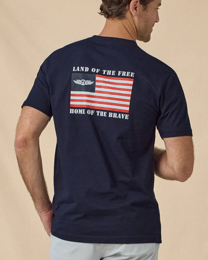 Free & Brave Tee in Navy, back model view with patriotic graphic print
