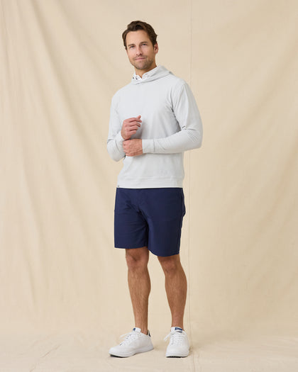 Model styled in the Hermosa Hoodie in Silver with navy shorts