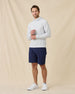 Model styled in the Hermosa Hoodie in Silver with navy shorts