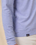 Close-up of the Hermosa Hoodie in Tidal Blue highlighting the cross-dyed heather fabric and signature Straight Down hem label